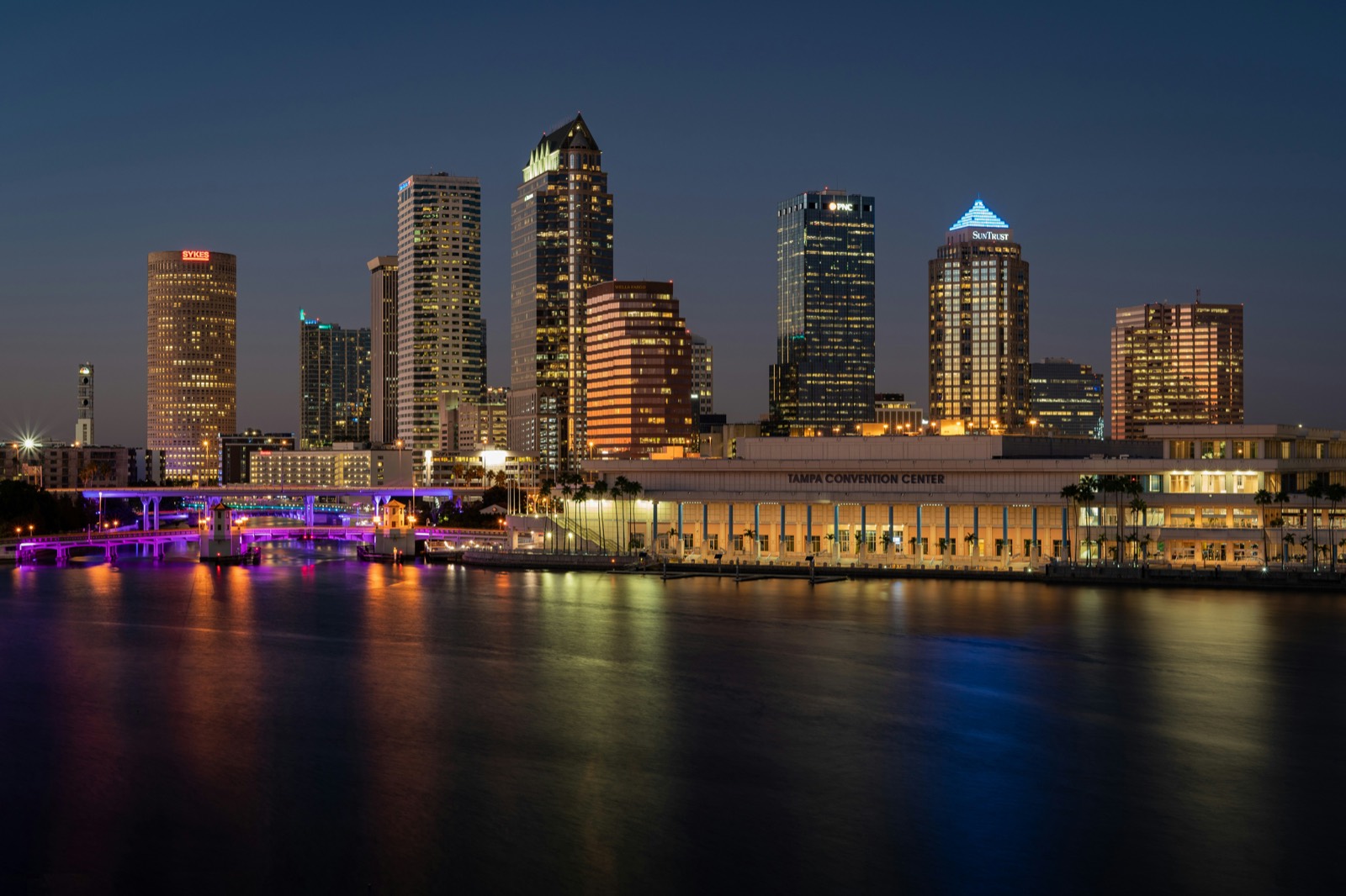 Downtown Tampa skyline at dusk across the water